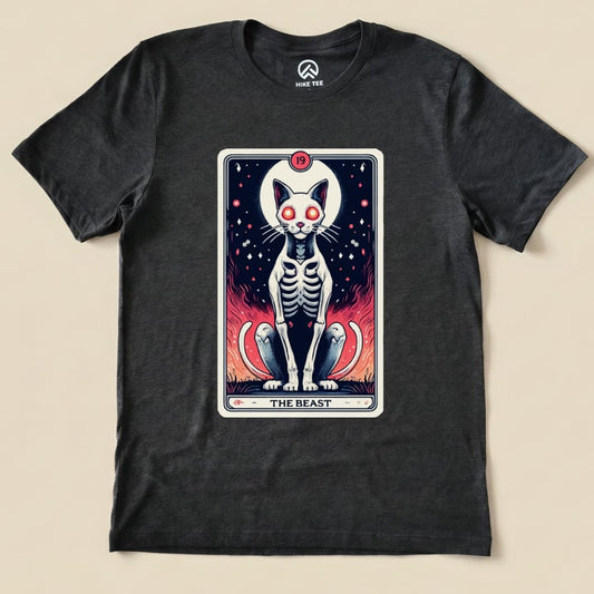 The graphic t-shirt features "The Beast Tarrot Cat shirt," showcasing a skeleton cat with glowing eyes and vibrant flames.