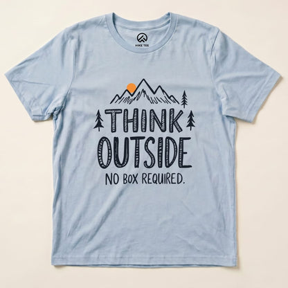 A light blue graphic t-shirt features mountains, trees, and the phrase "Think Outside, No Box Required.