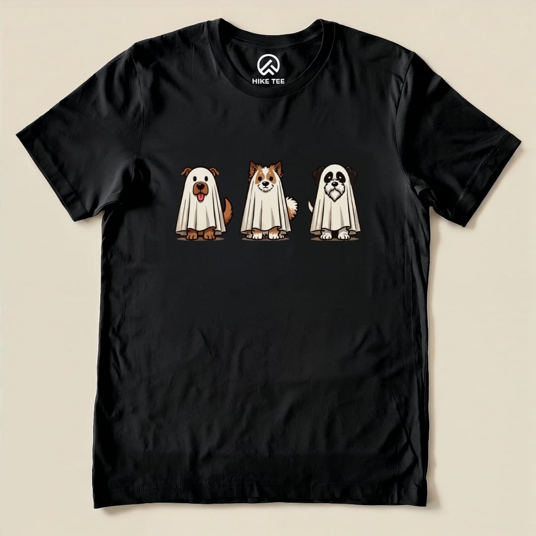 The Three Dog Ghost Shirt features three cartoon dogs in ghost costumes on a black graphic t-shirt.
