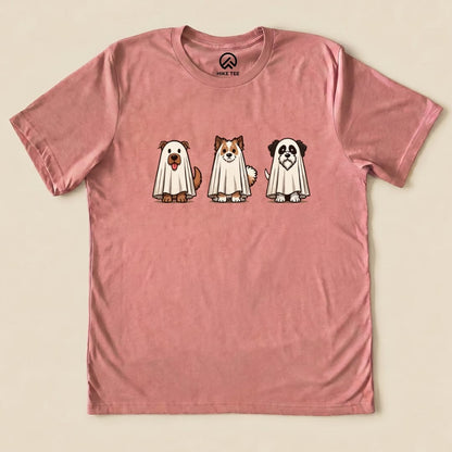 A graphic t-shirt featuring a playful illustration of three dogs wearing ghost costumes, titled "Three Dog Ghost Shirt".