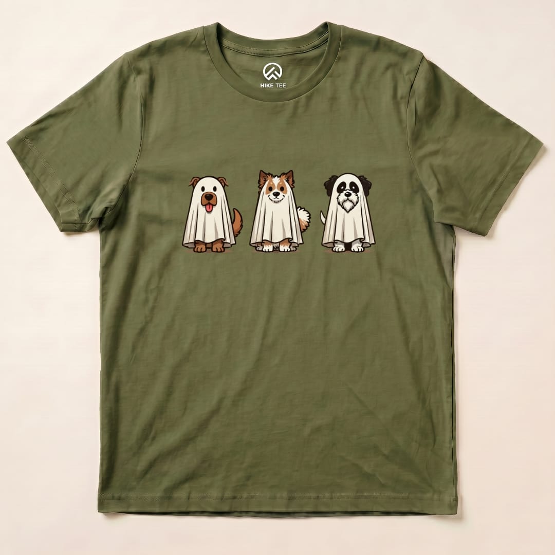 The graphic t-shirt features three cartoon dogs dressed as ghosts, titled "Three Dog Ghost Shirt," on an olive green background.