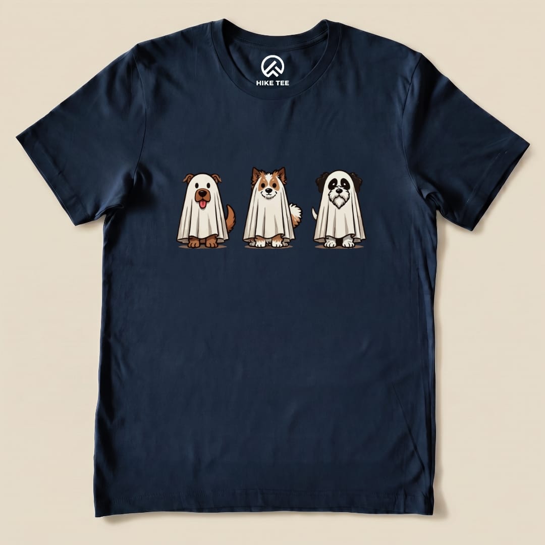 The Three Dog Ghost Shirt features three cartoon dogs dressed as ghosts, printed on a navy graphic t-shirt.