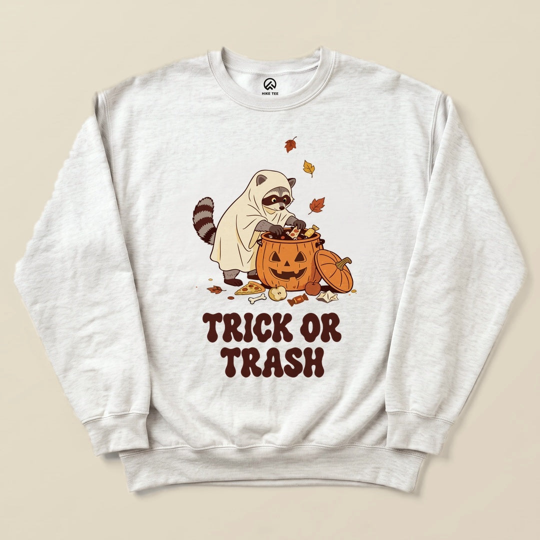 Ash Trick or Trash Sweatshirt with a raccoon in a ghost costume raiding a pumpkin candy bucket graphic