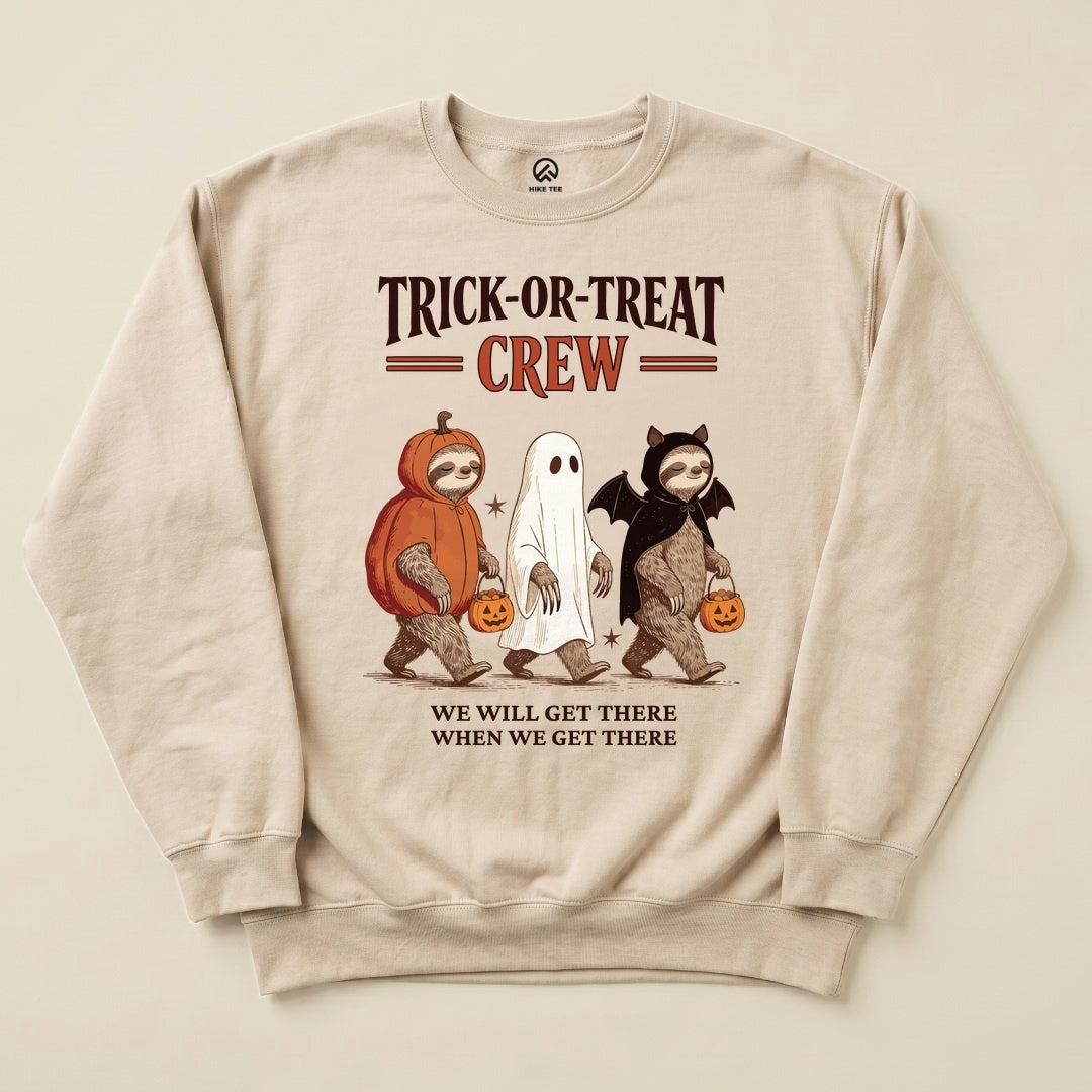 Sand Trick-or-Treat Crew Sweatshirt with a sloth trio in Halloween costumes graphic