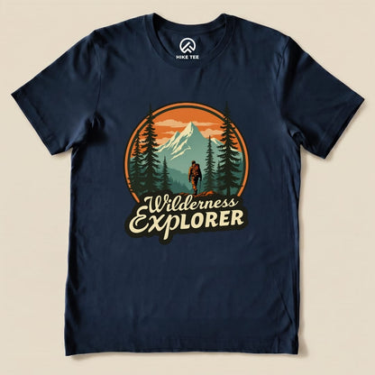 A graphic t-shirt featuring a scenic mountain design with the words "Wilderness Explorer" and silhouette of a hiker.