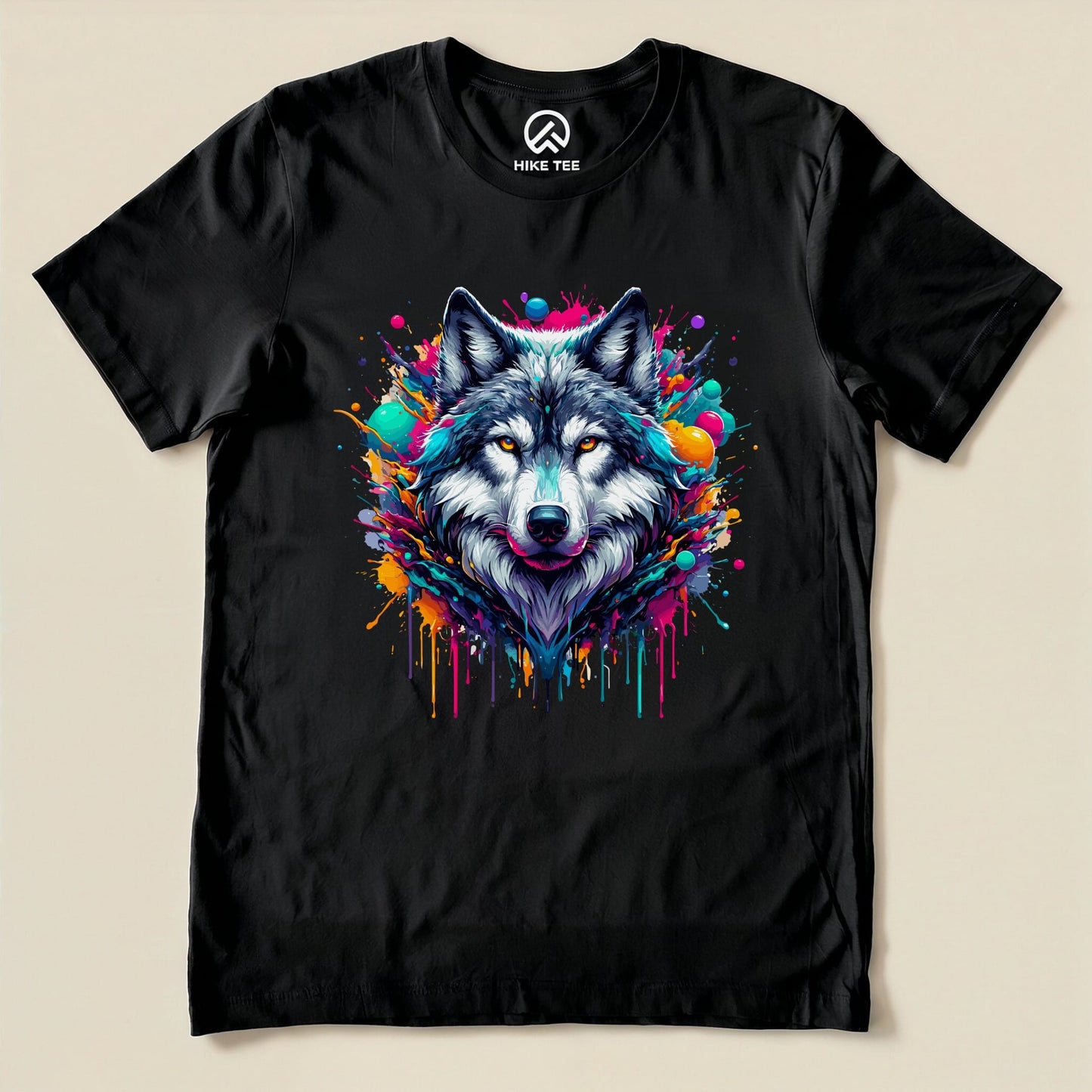 A black graphic t-shirt featuring a vibrant, colorful wolf design with splashes of paint surrounding its head, labeled "Wolf Colorful Shirt.