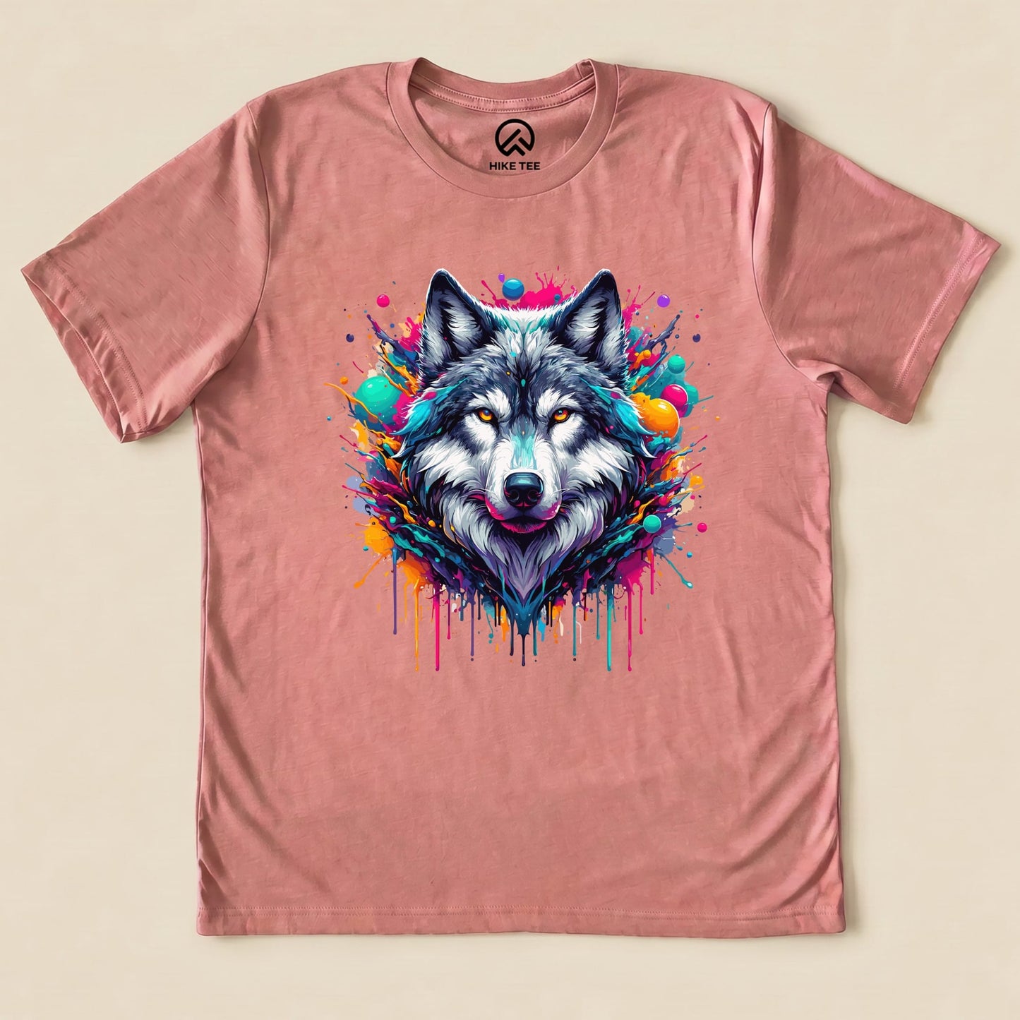 The graphic t-shirt features a vibrant wolf design surrounded by colorful splashes, showcasing the "Wolf Colorful Shirt.