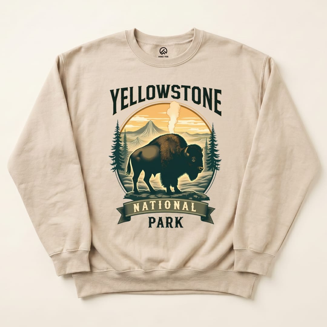 Graphic t-shirt featuring a Yellowstone Bison Sweatshirt design with a bison and mountain scenery, emphasizing national park themes.