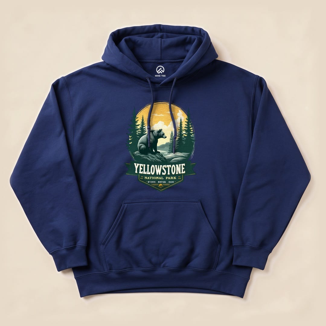 A navy hoodie featuring a graphic of a grizzly bear in Yellowstone National Park, with text below reading "Yellowstone National Park.