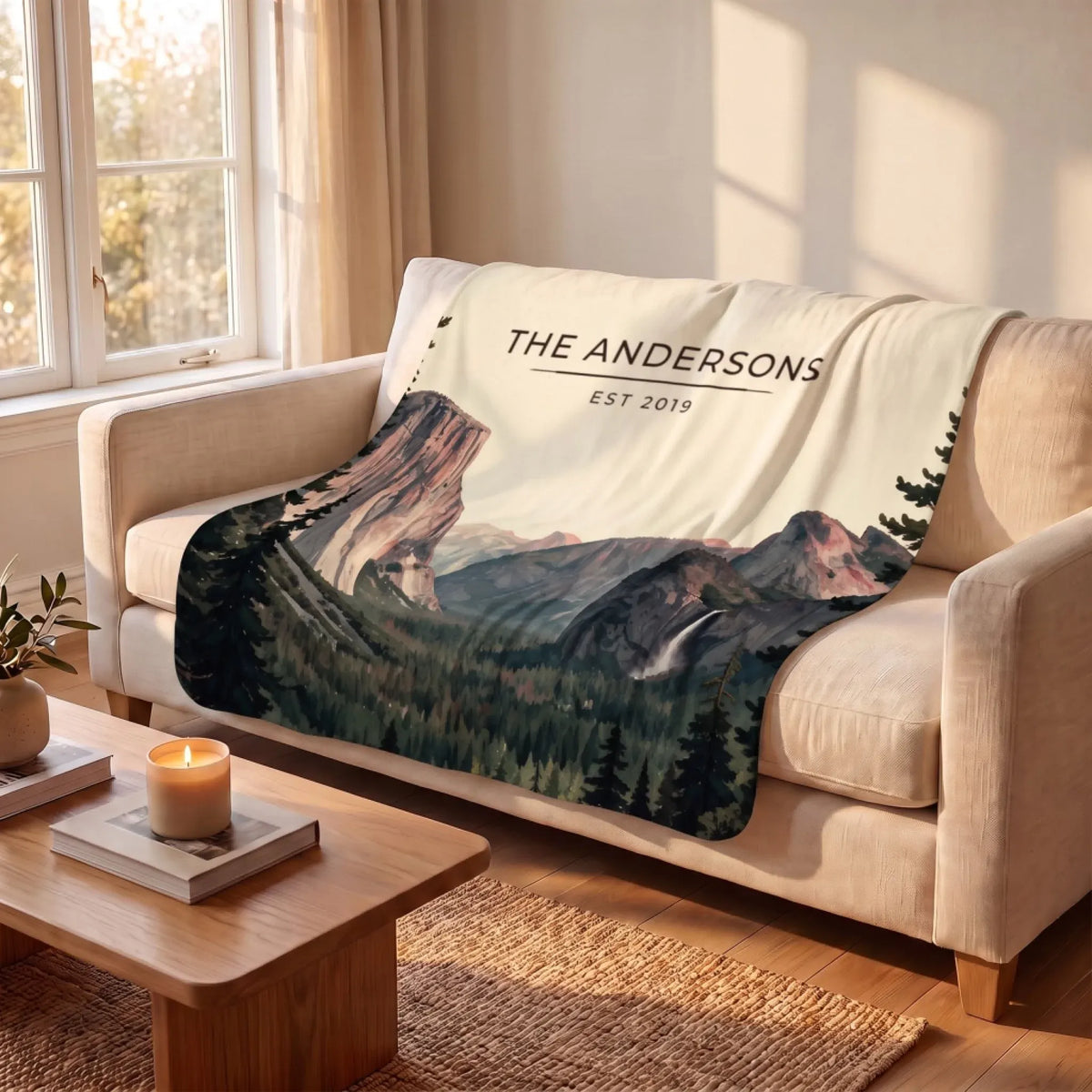 Yosemite Tunnel View Sherpa Blanket draped over a sofa